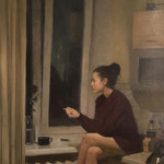 Девушка курит у окна